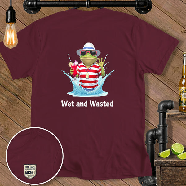 T-shirt with frog character holding a drink and wearing a hat and sunglasses. Text "Wet and Wasted".