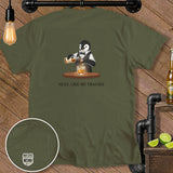 Olive green t-shirt with penguin pouring whiskey and text 